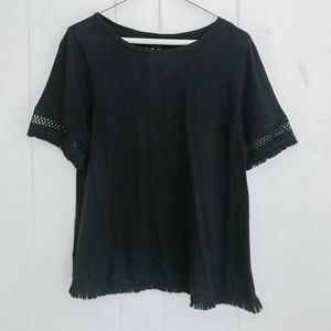 navy top with textured sleeves and bottom.